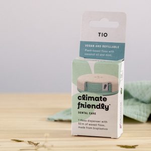 hilo dental vegano encerado con aceite de ricino y aceite de coco y aroma mentolado.